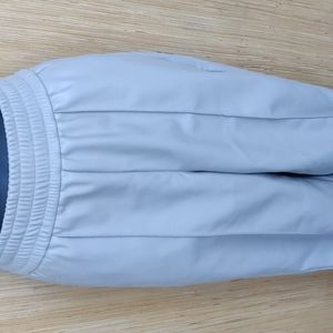 Off white faux leather joggers